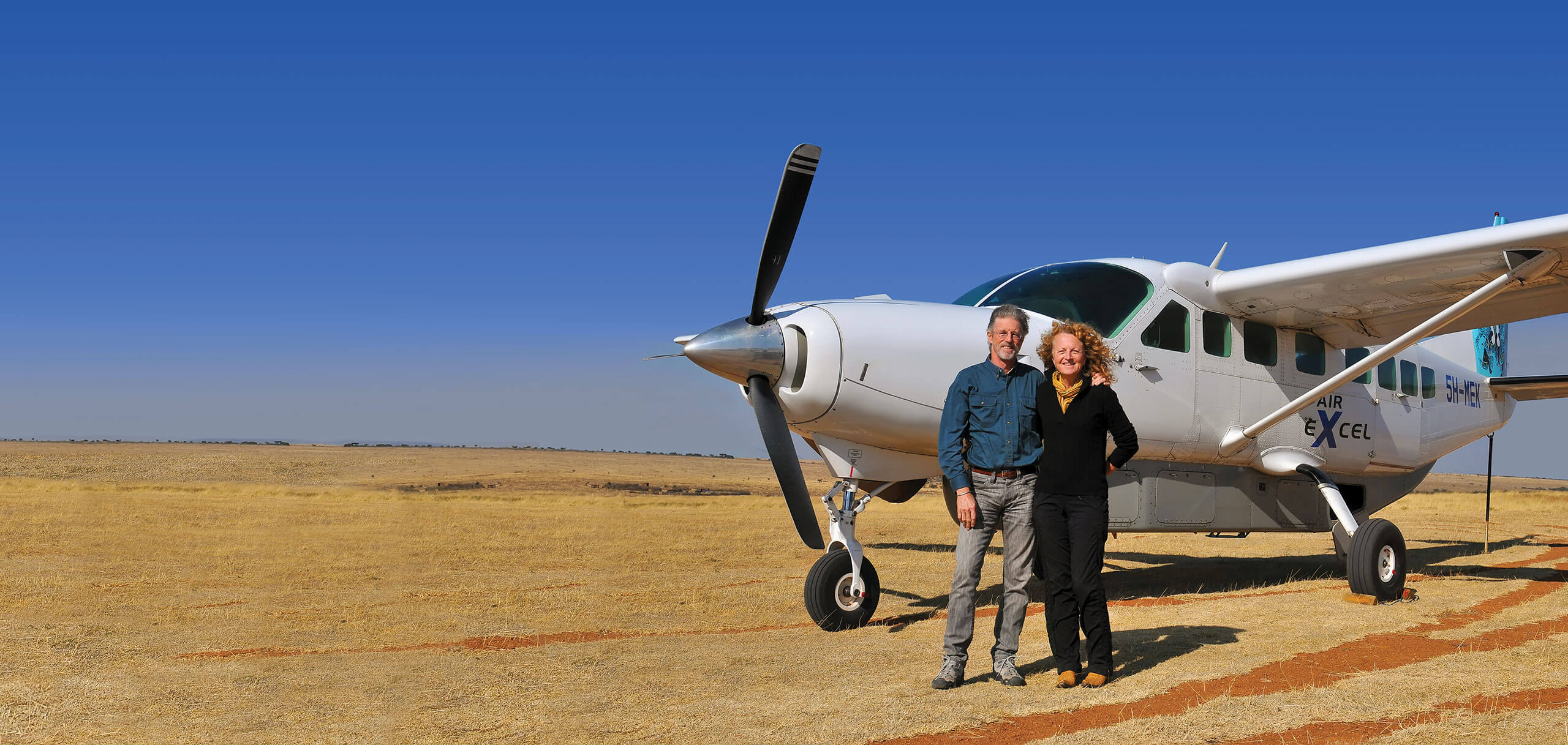 rick and judi arriving by plane to serengeti