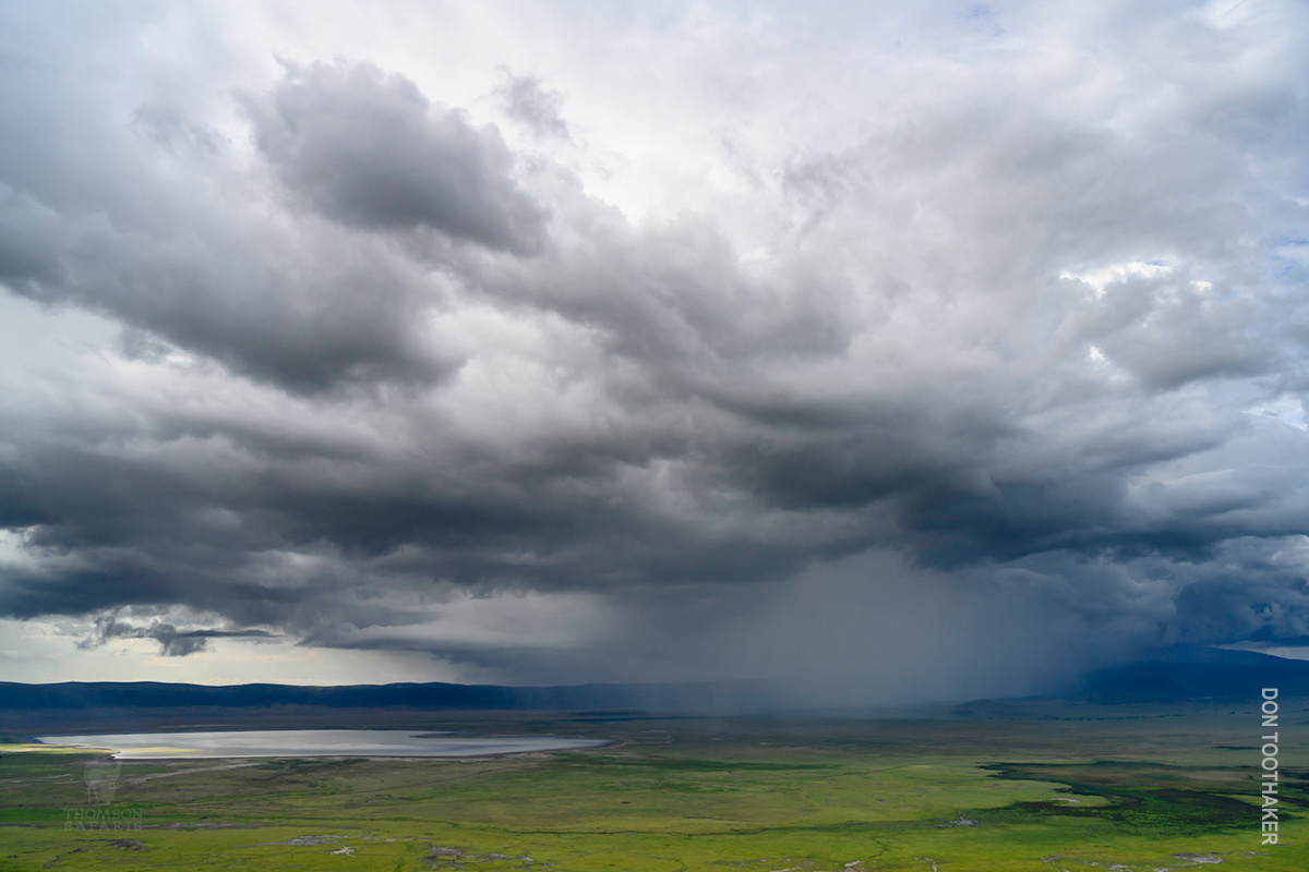 clouds make dramatic backdrop in ngorongoro crater