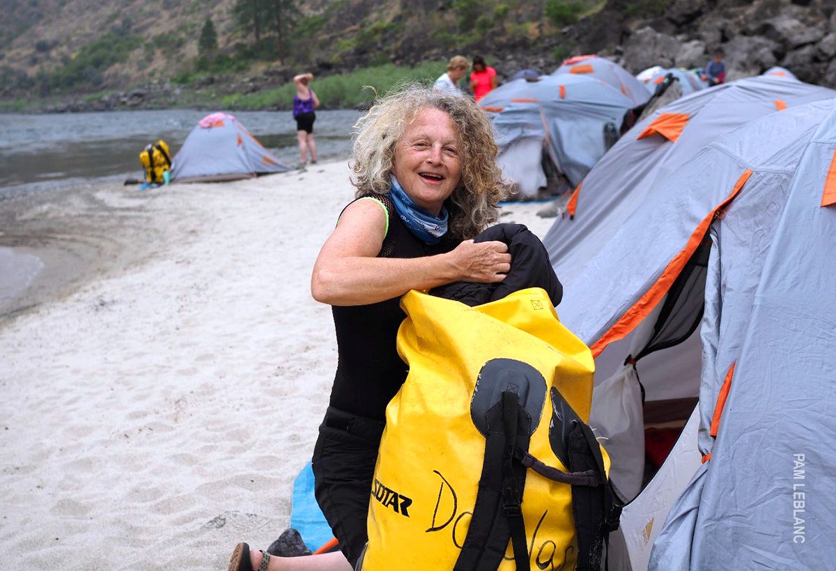 judi setting up her tent along salmon river