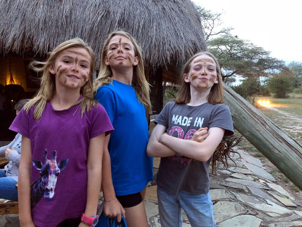 girls on family safari in serengeti