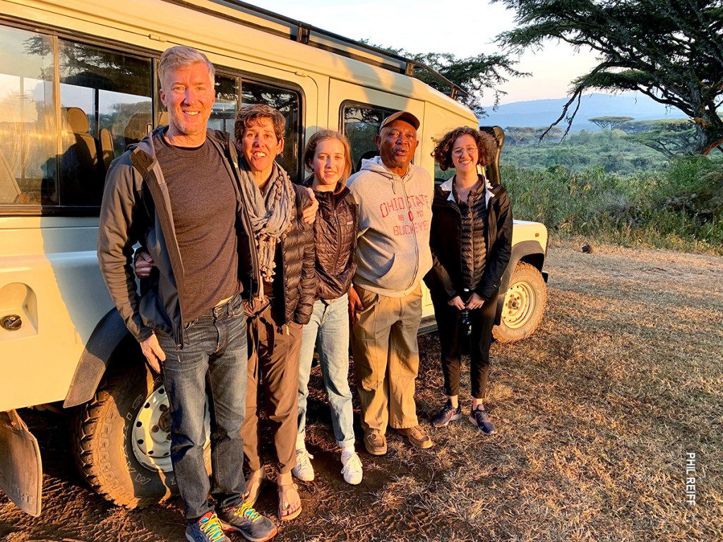 family on thomson safari in serengeti