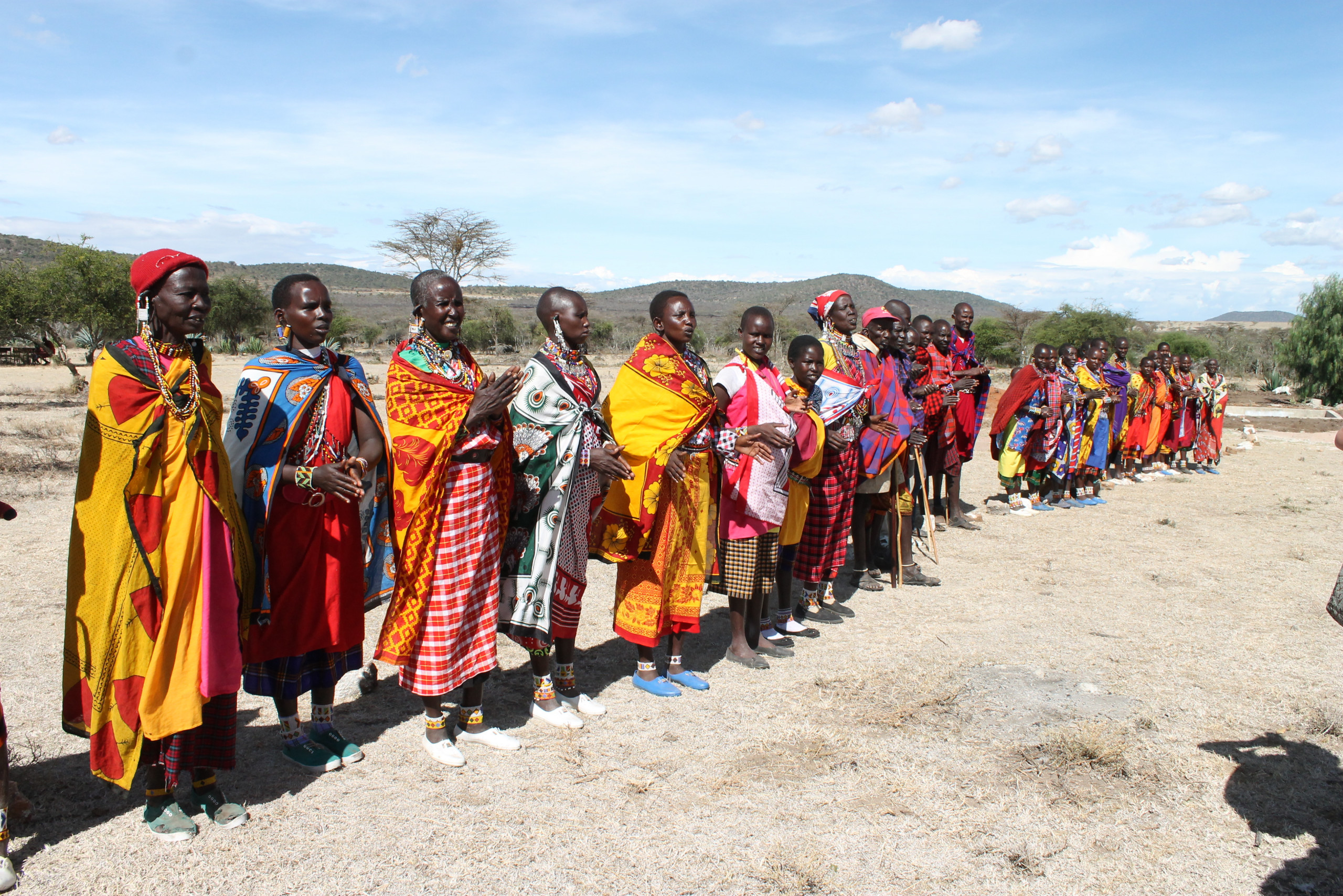 tanzania women wearing bright fabrics