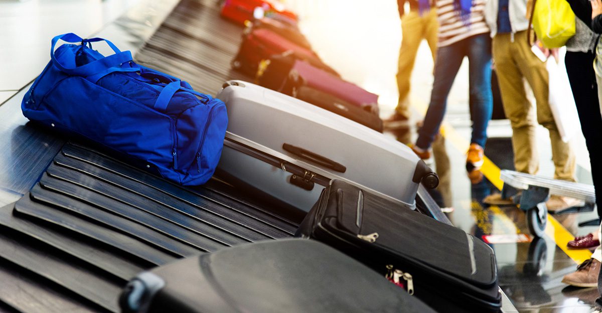 duffle bag on airport luggage carousel