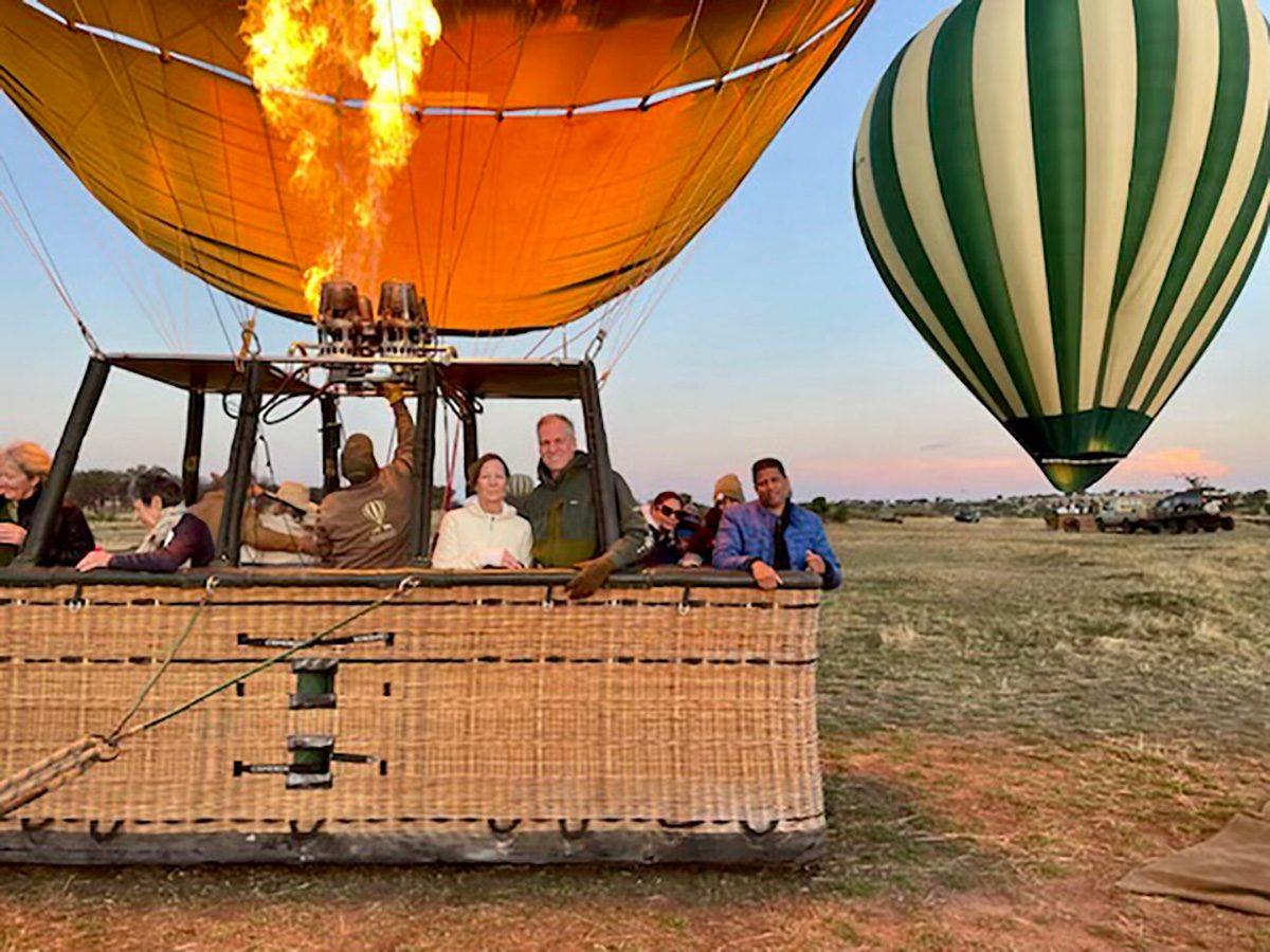 thomson guests in hot air balloon in serengeti