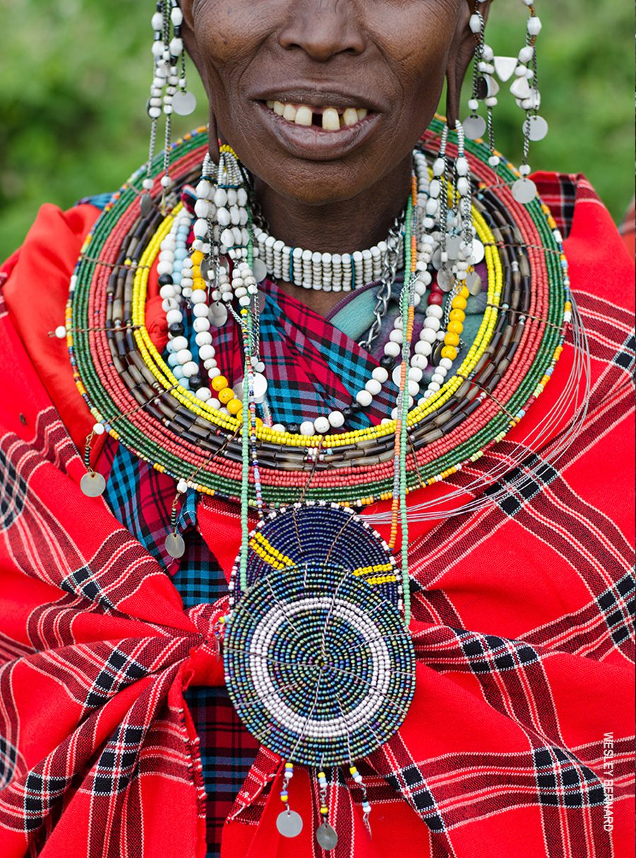 portrait of maasai woman beading