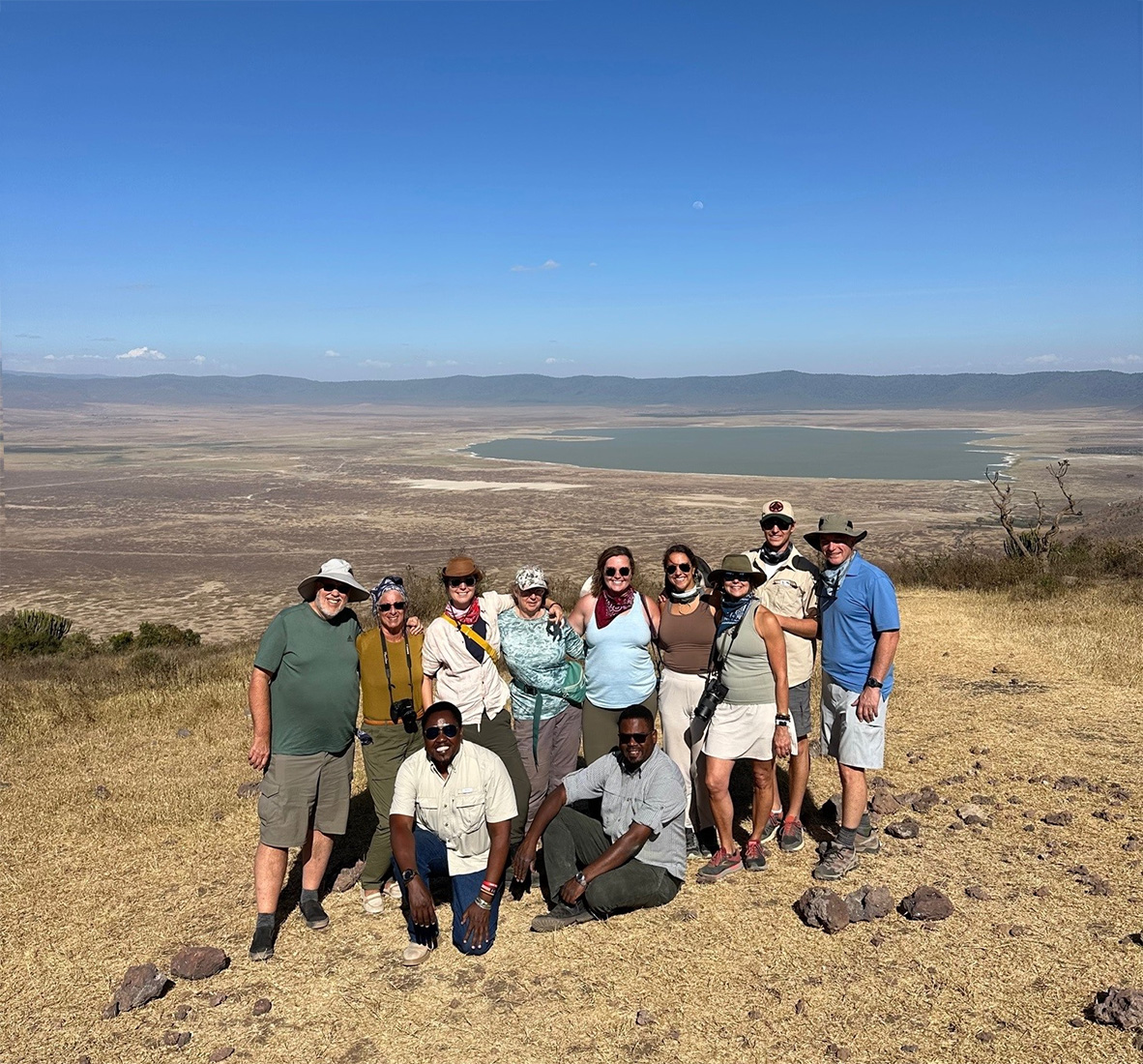 thomson safaris family guests with guides at ngorongoro crater tanzania