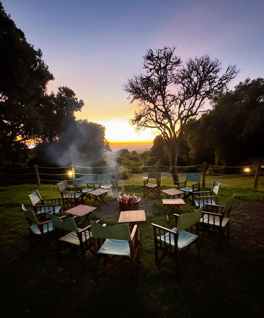 sunset at campfire in thomson ngorongoro crater camp