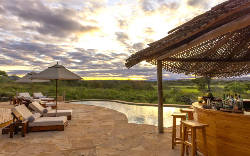 poolside lounges on luxury safari in tanzania