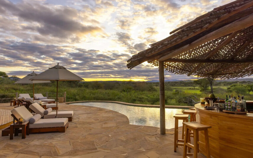poolside lounges on luxury safari in tanzania