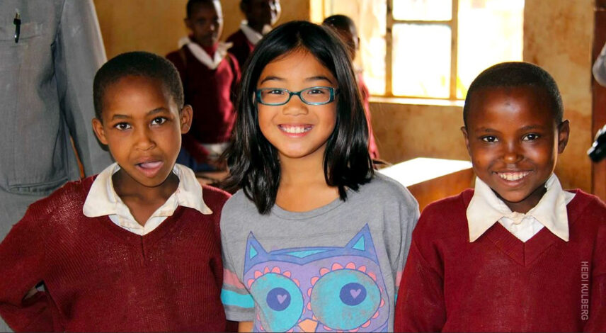 meeting school children in tanzania on family safari