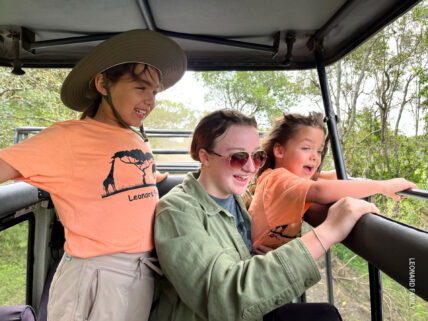 family in landrover on safari in tanzania