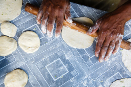 thomson camp chef rolling out dough