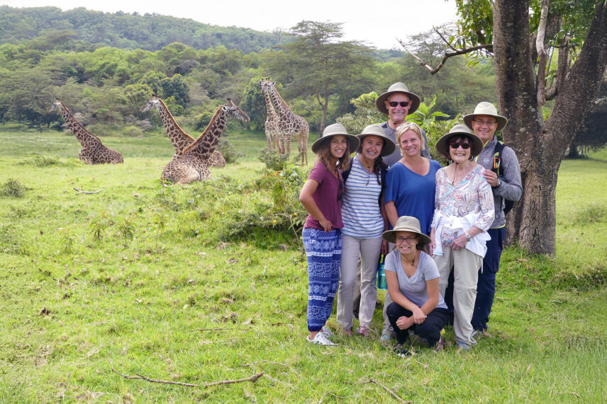 family safari experience with giraffes in tanzania