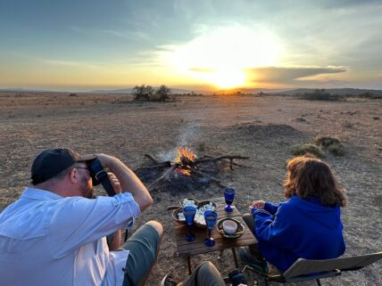 family safari sundowners at eastern serengeti nyumba camp