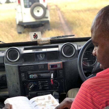 thomson safaris guide ojukwu identifies bird species
