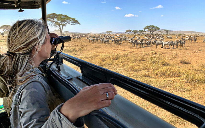 woman on holiday safari in serengeti