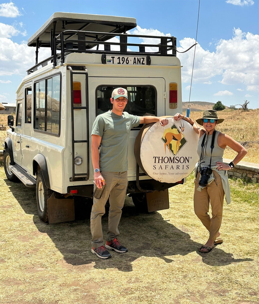 thomson guests take a wildlife viewing break from their landrover in serengeti