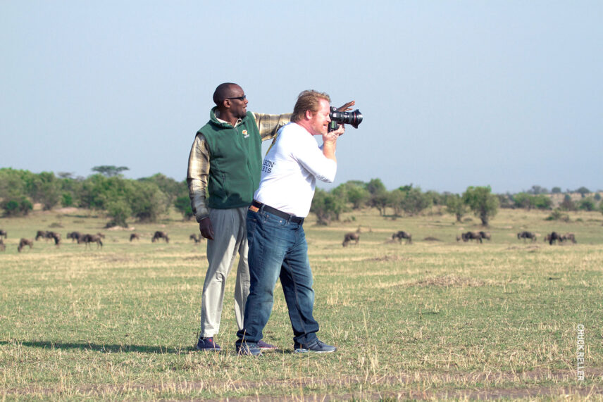 thomson guide mustapha advises guest on best photograph of wildlife